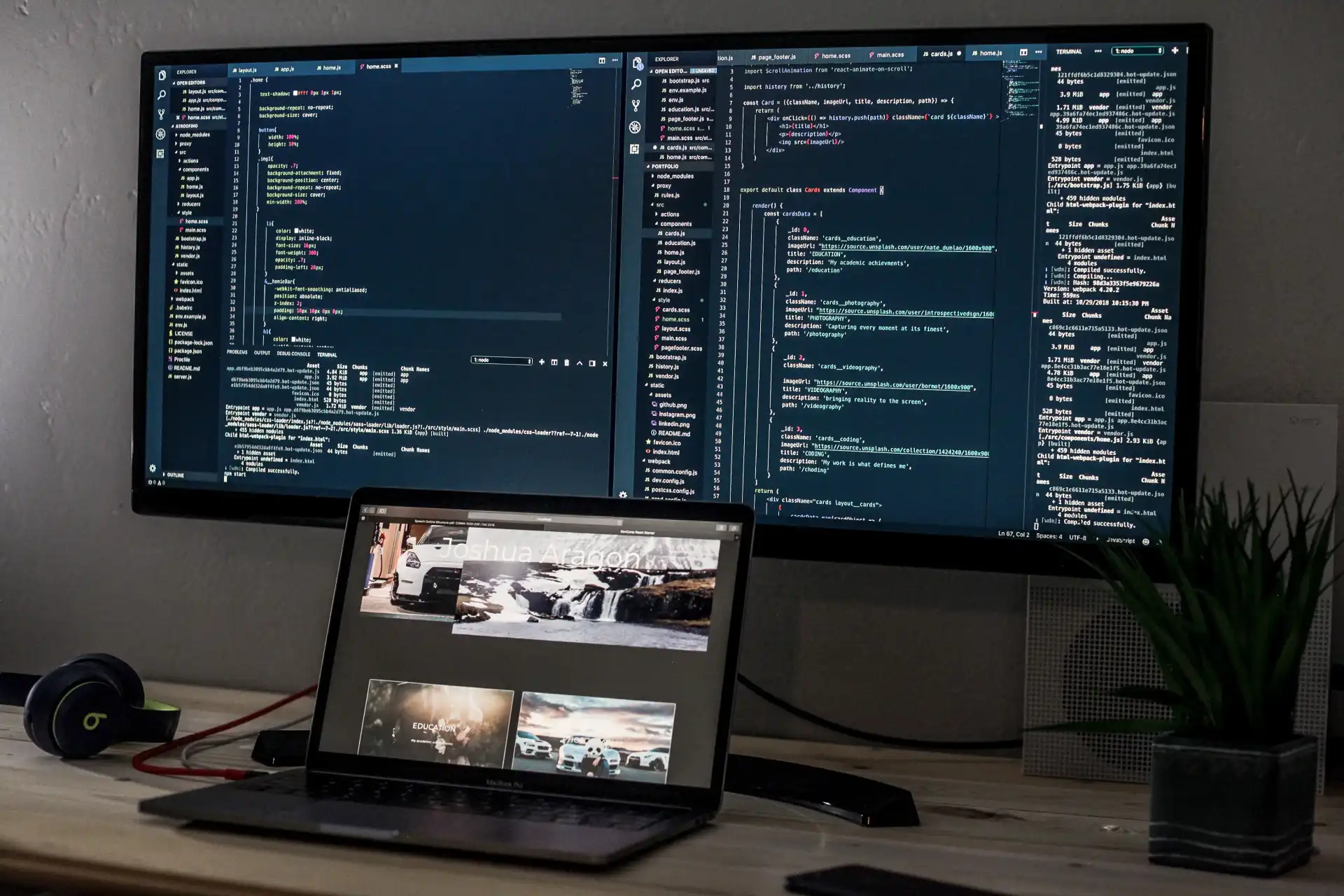 VS code coding with laptop and additional big split screen